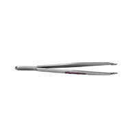 Metal tweezers on a white background